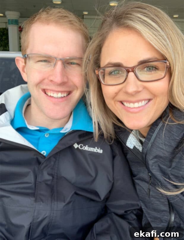 A man and woman smiling.