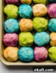 Sugared Delights 10 Sugar cookie dough balls coated in colored sugar.