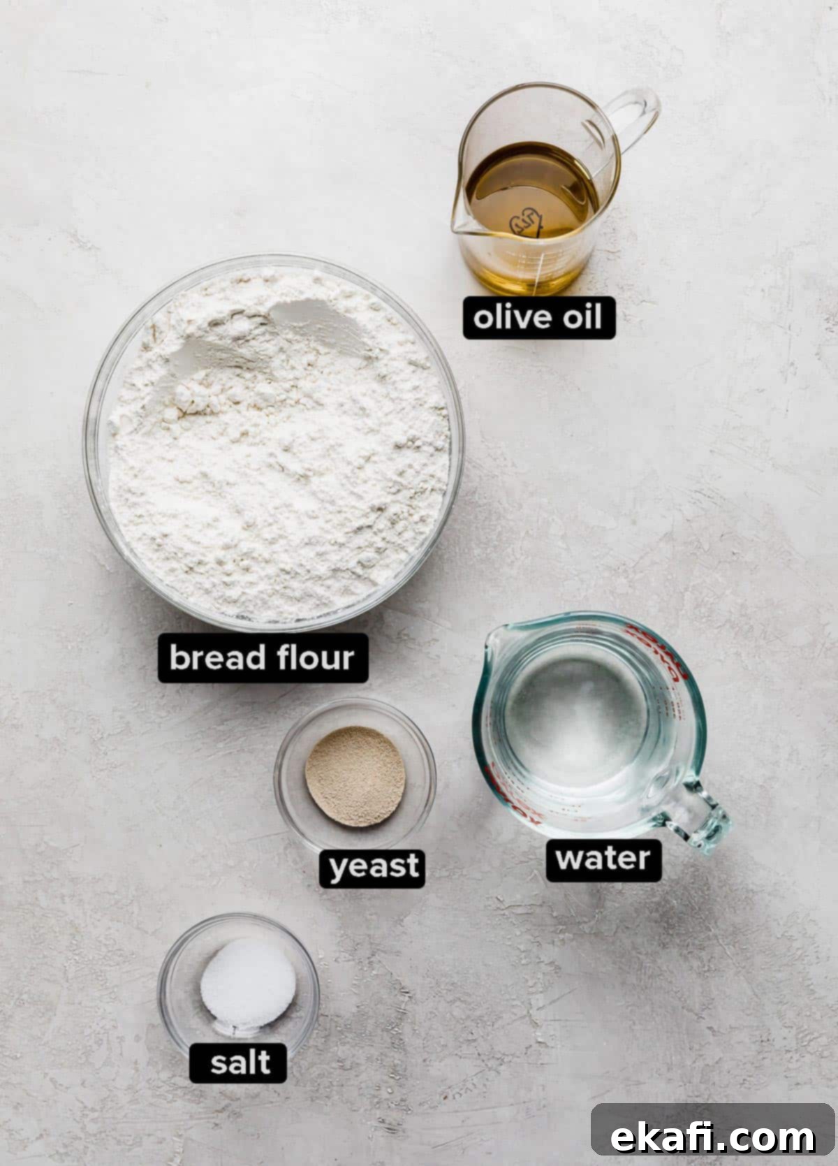 Artisanal Focaccia Bread 4 Focaccia Bread ingredients on a textured white background.
