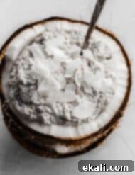 Tropical Chia Pudding Bliss 6 Overnight Coconut Chia Pudding in a raw coconut.