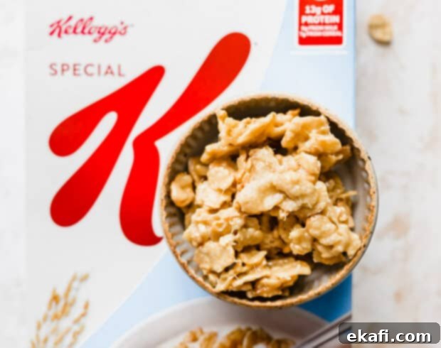 Special K Crunch Bites 8 A bowl of homemade Special K Cereal Candy sitting on top of a box of Special K Cereal, ready to be enjoyed.