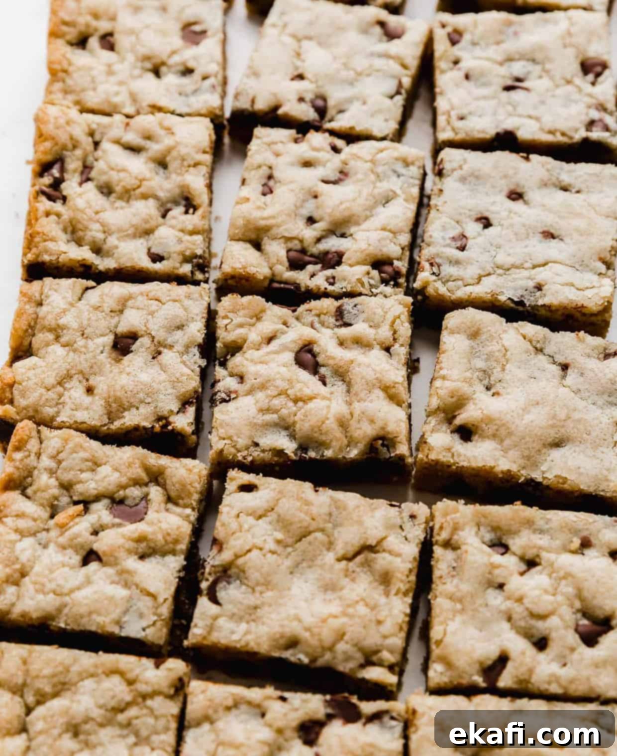 Decadent Chocolate Chip Cookie Bars 10 A side angle of freshly baked Chocolate Chip Cookie Bars, cut into perfect squares and ready to serve.