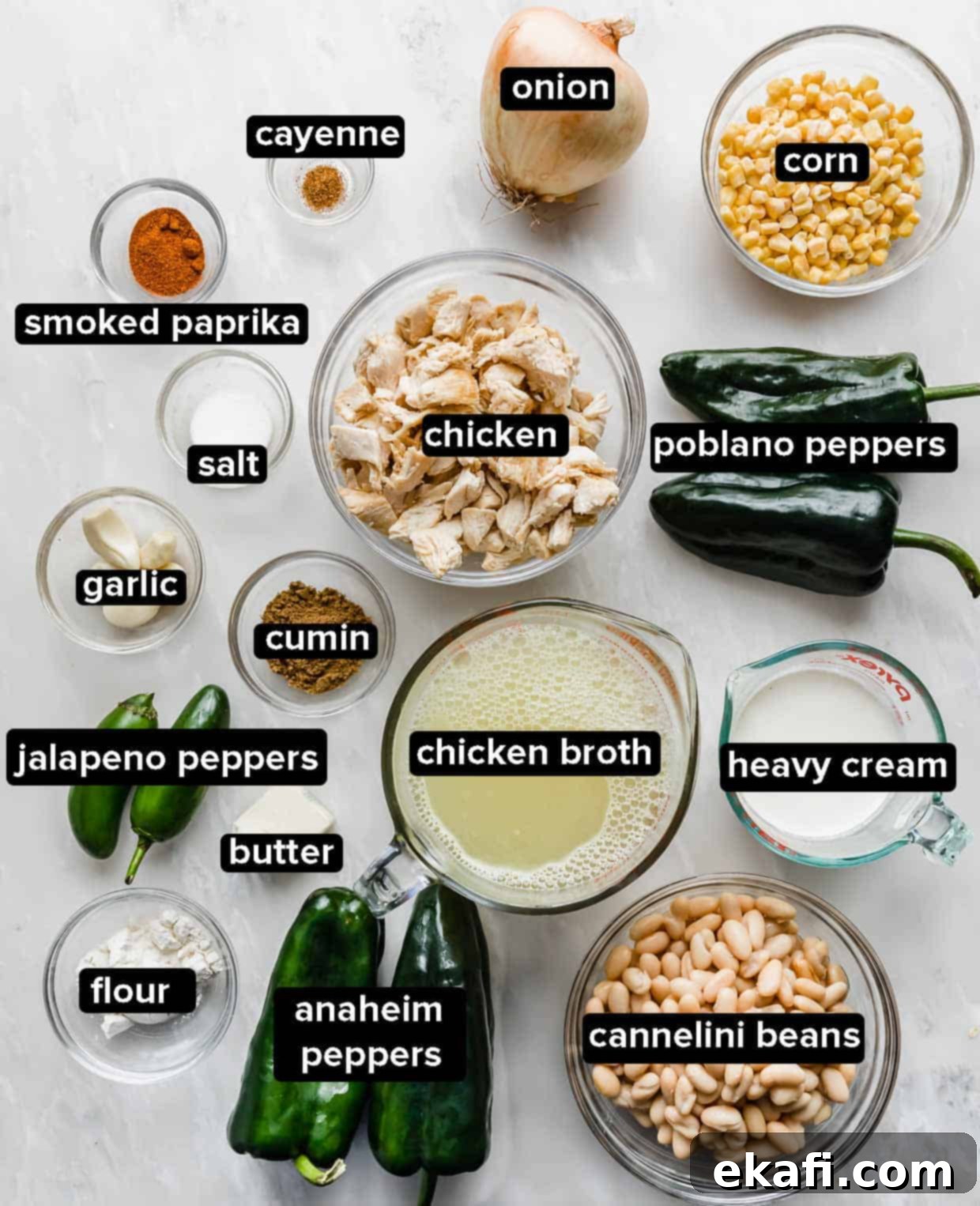 Creamy White Chicken Chili 3 The Best White Chicken Chili Recipe ingredients laid out on a clean white background.